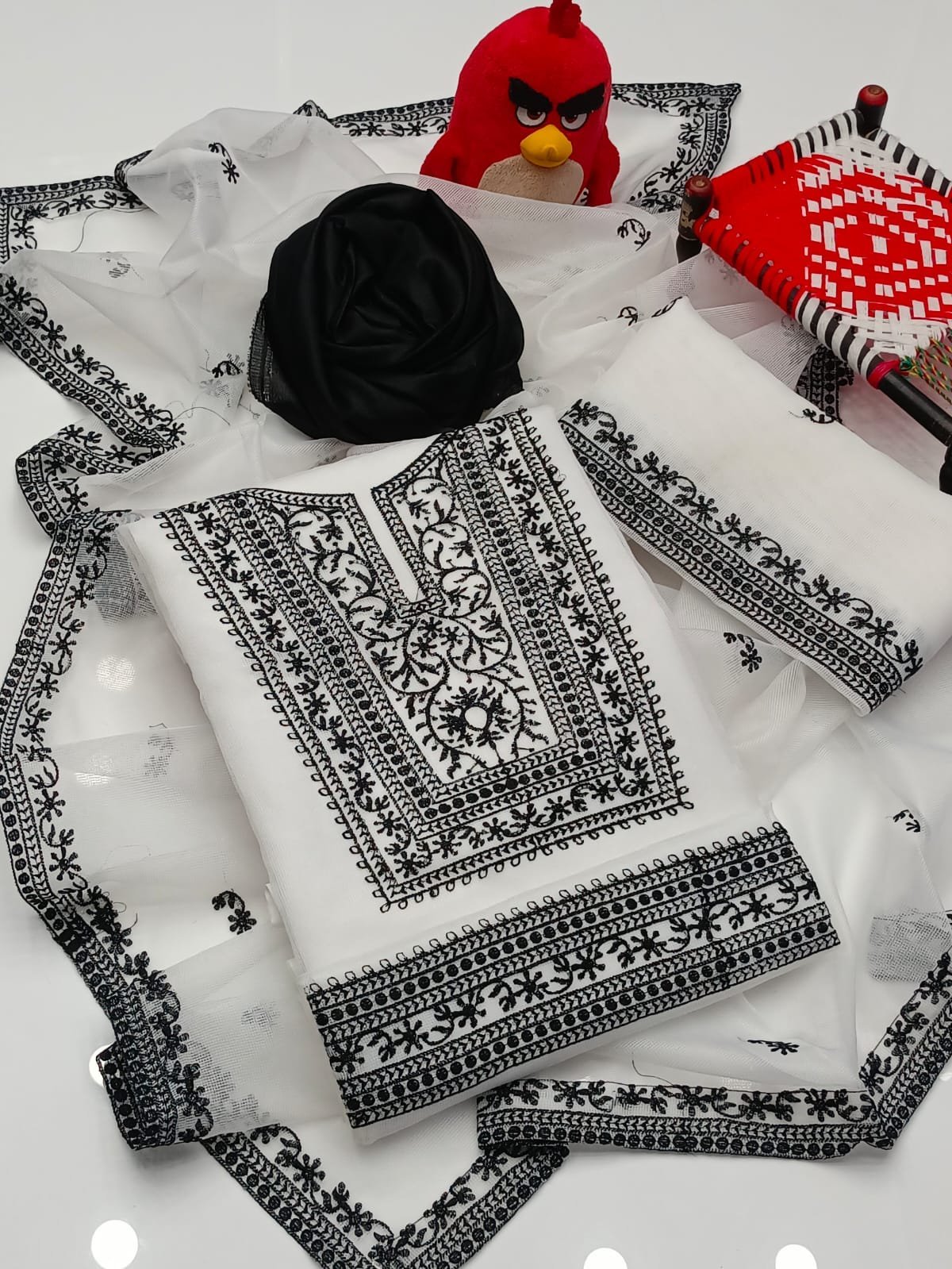 3 Pcs Khaddi Net Embroidered Suit with Khatan Trouser (Unstitched) - Image 4